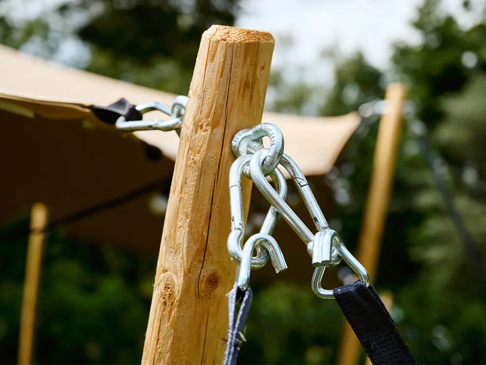 Stretchtent 6 x 10 m: palenset + verankering